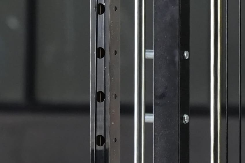 Holes for cable adjustment on smith machine