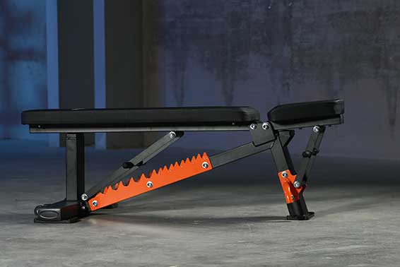 A black adjustable bench is lies