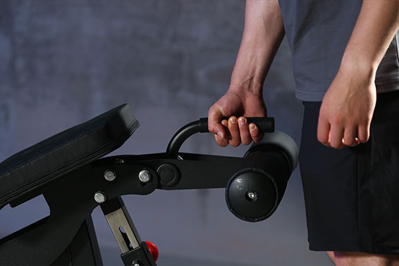 A black bandle on the weight bench