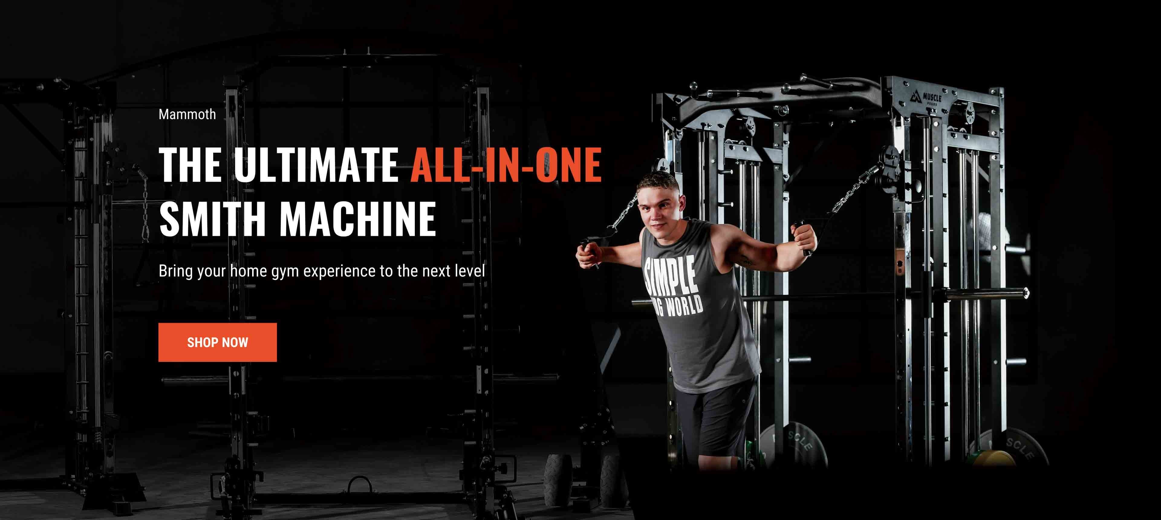 A man is working out on a black smith machine. 